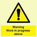gender-neutral-construction-warning-sign-warning-work-in-progress-above-with-exc~